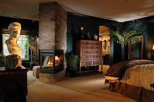 Bedroom photo with fireplace
